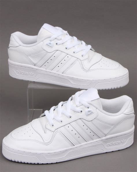 all white low top Adidas